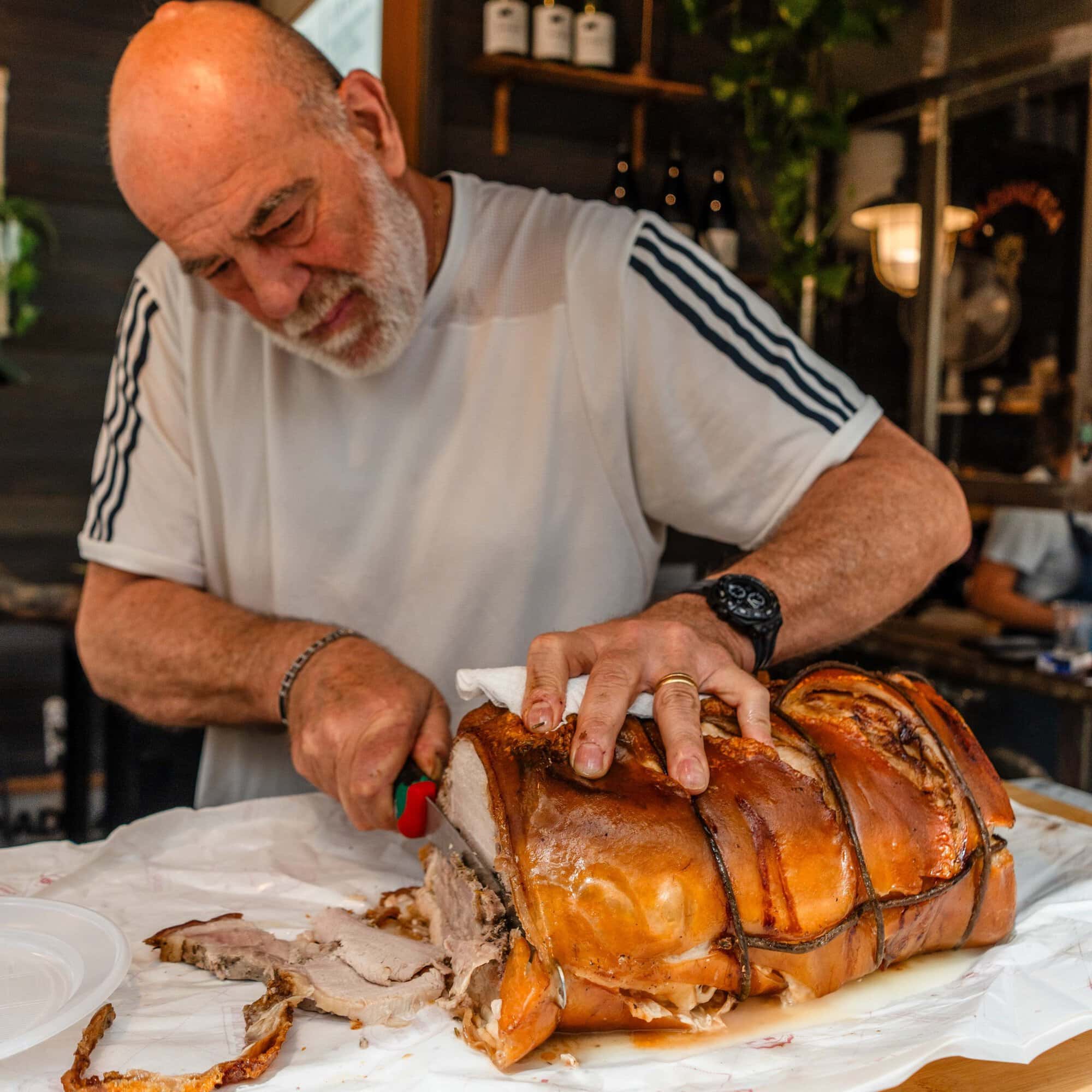 Cutting porchetta